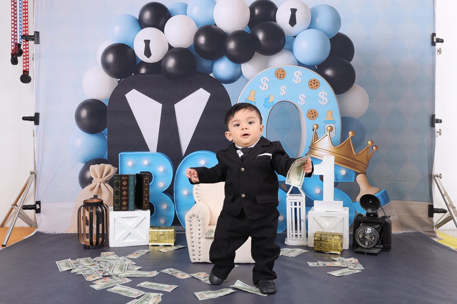 Archer standing with cash bills